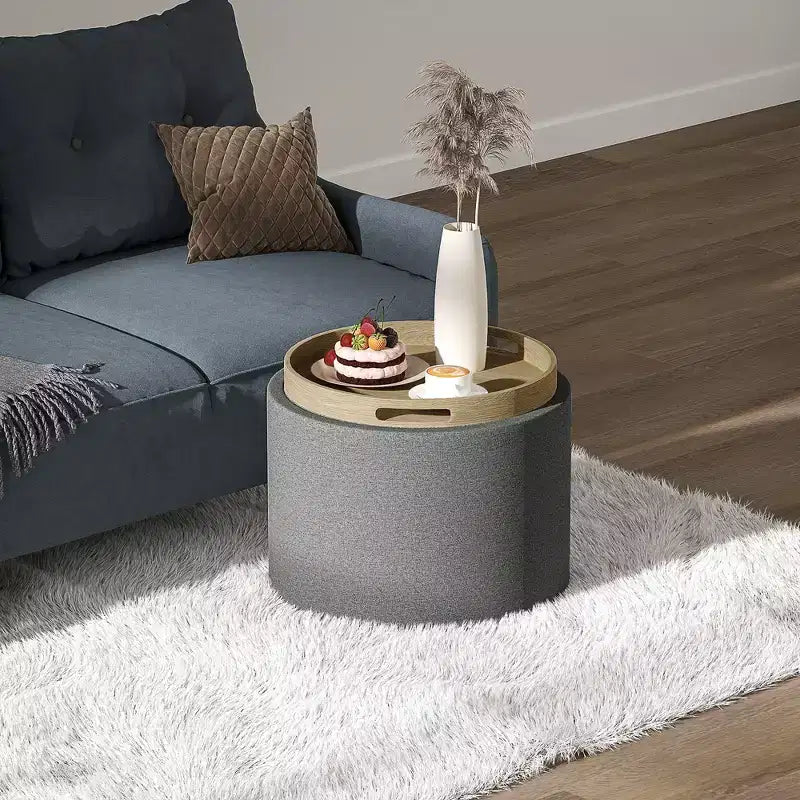 Tavolino Poggiapiedi Contenitore con Vassoio Ribaltabile e Spazio Nascosto, Pouf Rotondo Rivestito in Tessuto Effetto Lino