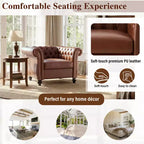 Poltrona Chesterfield Club con braccioli arrotolati, borchie e gambe in legno massello