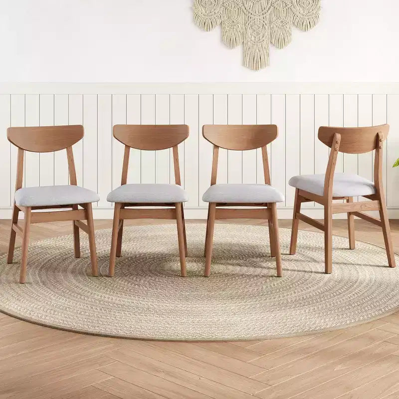 Set di 4 sedie moderne Maddox con schienale curvo in legno e seduta in tessuto grigio